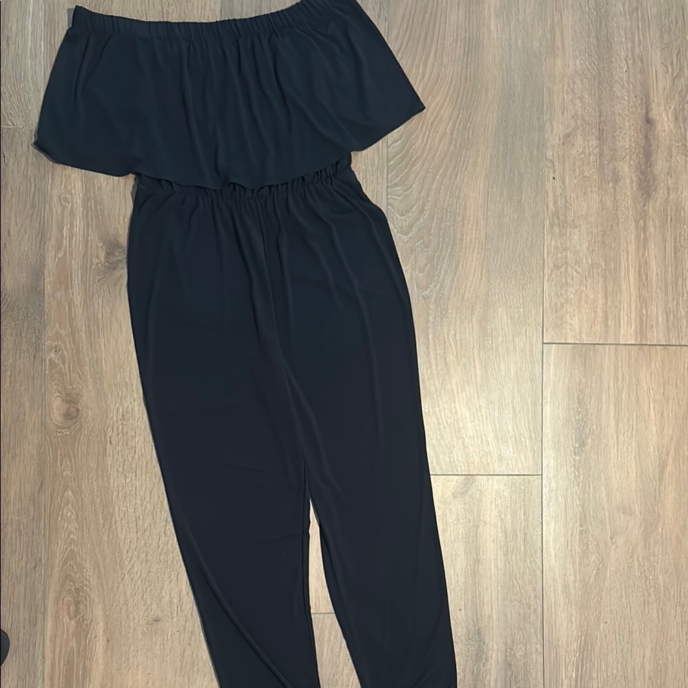C. Black Strapless Jumpsuit with Ruffled Neckline